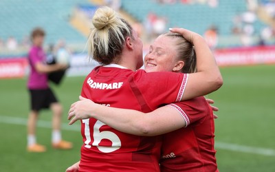 270626 - Barbarians v Wales Women -  Kelsey Jones of Wales with Seren Lockwood of Wales at the end of the match