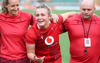 270626 - Barbarians v Wales Women - Alex Callender of Wales speaks to the players at the end of the match