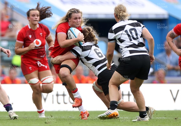 270626 - Barbarians Women v Wales Women - Friendly - Alex Callender of Wales is tackled by Amy Rule of Barbarians 