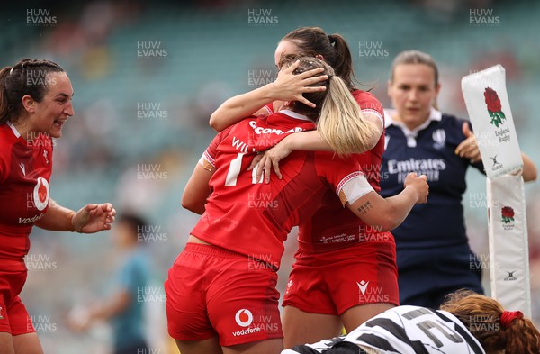 270626 - Barbarians Women v Wales Women - Friendly - Amy Williams of Wales celebrates scoring a try with team mates