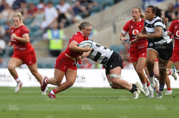 270626 - Barbarians Women v Wales Women - Friendly - Molly Reardon of Wales is tackled by Amy Rule of Barbarians 