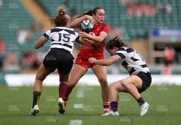 270626 - Barbarians Women v Wales Women - Friendly - Nel Metcalfe of Wales is tackled by Lori Cramer of Barbarians 