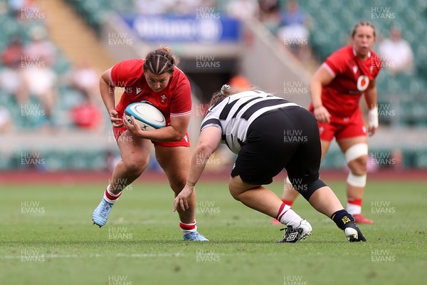 270626 - Barbarians Women v Wales Women - Friendly - Stella Orrin of Wales is tackled by Bryony Cleall of Barbarians 