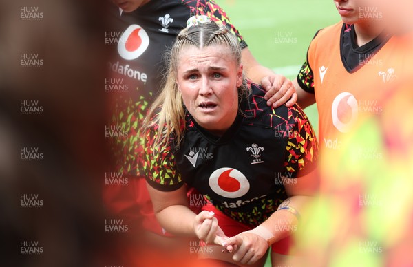 270626 - Barbarians v Wales Women - Alex Callender of Wales speaks to her players
