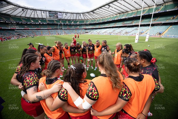 270626 - Barbarians v Wales Women - Wales huddle up ahead of the match