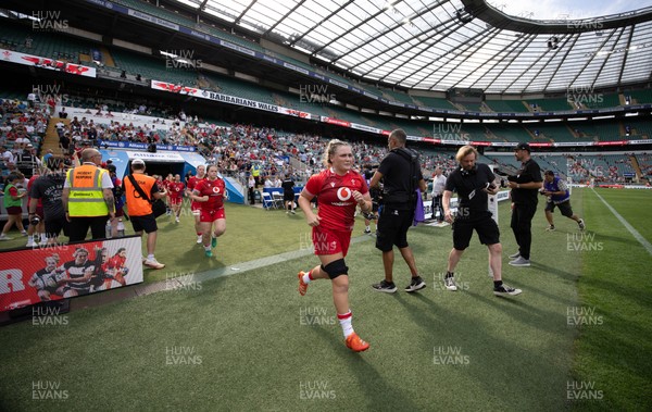 270626 - Barbarians v Wales Women - Alex Callender of Wales leads the team out at the start of the match