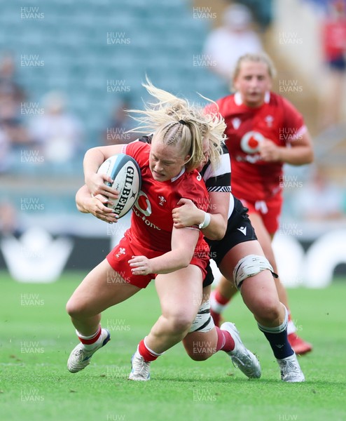 270626 - Barbarians v Wales Women - Seren Lockwood of Wales is tackled