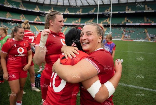 270626 - Barbarians v Wales Women - Lucy Isaac of Wales and Molly Reardon of Wales celebrate at the end of the match