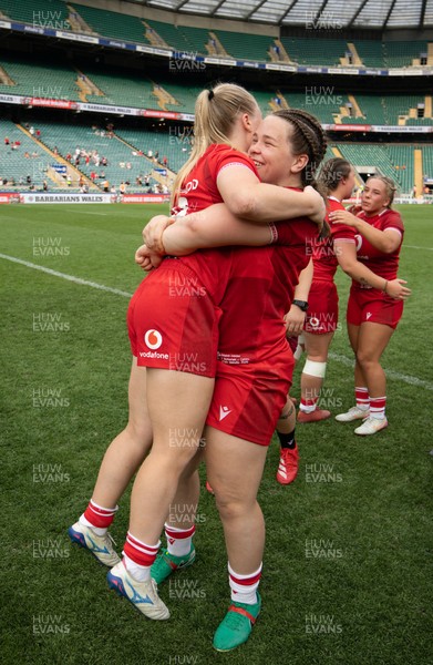 270626 - Barbarians v Wales Women - Maisie Davies of Wales and Seren Lockwood of Wales celebrate at the end of the match