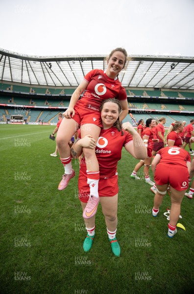 270626 - Barbarians v Wales Women - Lily Hawkins of Wales is held aloft by Maisie Davies of Wales at the end of the match