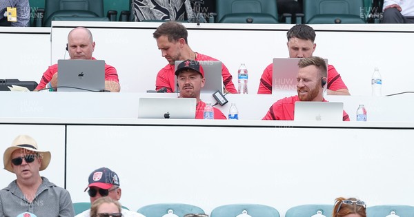 270626 - Barbarians v Wales Women - Wales management ahead of the match, back row left to right, Sean Lynn, Wales Women head coach, Ashley Beck, Wales Women interim attack coach, Analyst Tom Shephard, front row Analyst Adam Fuge and Tyrone Holmes, Wales Women defence coach