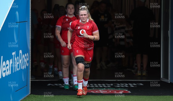 270626 - Barbarians v Wales Women - Alex Callender of Wales runs out at the start of the match