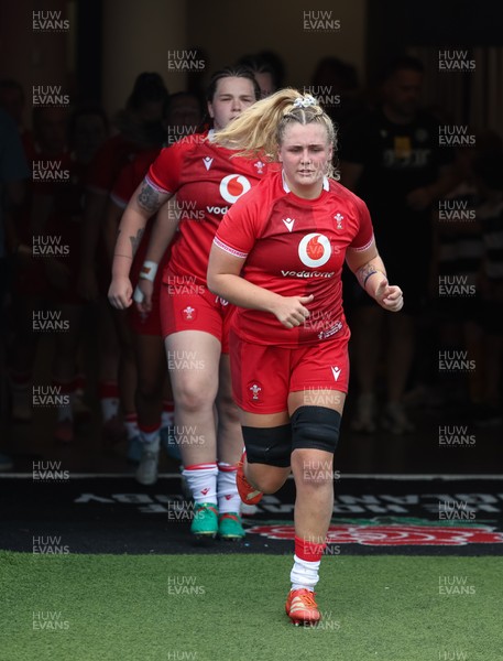270626 - Barbarians v Wales Women - Alex Callender of Wales runs out at the start of the match