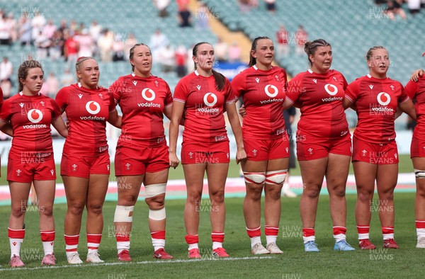 270626 - Barbarians v Wales Women - Wales line up for the anthems Left to right, Lily Hawkins, Kelsie Webster, Katherine Baverstock, Nel Metcalfe, Branwen Metcalfe, Stella Orrin and Molly Reardon