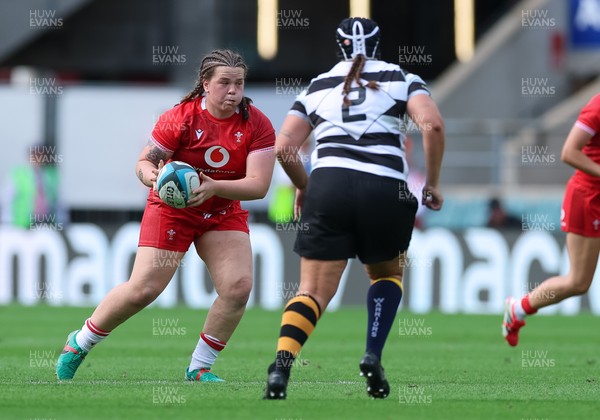 270626 - Barbarians v Wales Women - Molly Reardon of Wales takes on Carys Phillips of Barbarians