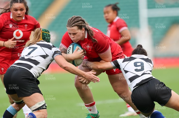 270626 - Barbarians v Wales Women - Maisie Davies of Wales is tackled just short of the line