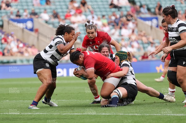 270626 - Barbarians v Wales Women - Sisilia Tuipulotu of Wales is tackled just short of the line