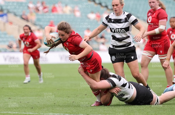 270626 - Barbarians v Wales Women - Lily Hawkins of Wales is tackled just short of the line