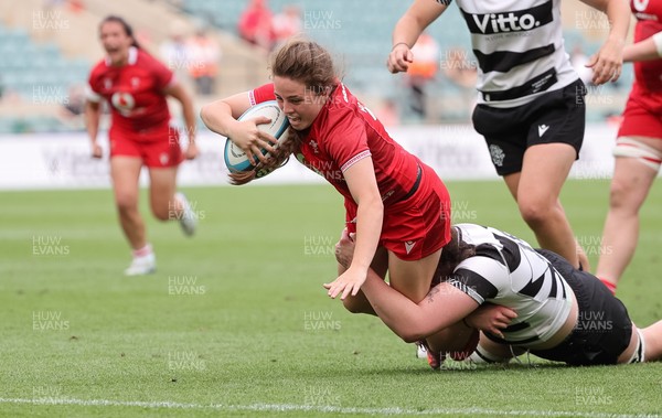 270626 - Barbarians v Wales Women - Lily Hawkins of Wales is tackled just short of the line