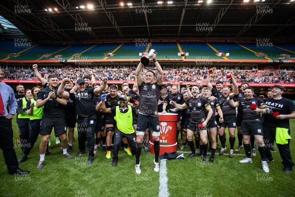240422 - WRU Championship Cup Final � Bargoed v Neath - Aaron Bramwell of Neath lifts the Cup with team mates