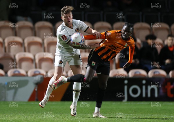 121223 - Barnet FC v Newport County - FA Cup Second Round Replay - James Clarke of Newport County is challenged by Idris Kanu of Barnet 