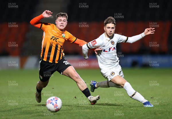 121223 - Barnet FC v Newport County - FA Cup Second Round Replay - Zak Brunt of Barnet is challenged by Lewis Payne of Newport County 