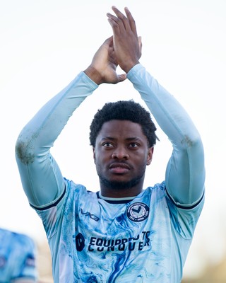 140326 - Barnet v Newport County - Sky Bet League 2 - Bobby Kamwa of Newport County applauds the fans after the match