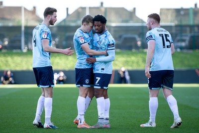 140326 - Barnet v Newport County - Sky Bet League 2 - Bobby Kamwa of Newport County celebrates his goal with teammates