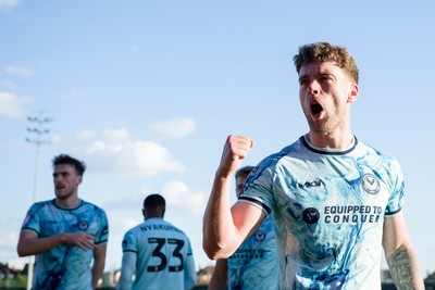 140326 - Barnet v Newport County - Sky Bet League 2 - Cameron Evans of Newport County celebrates James Crole of Newport County goal