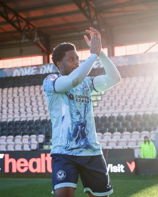 140326 - Barnet v Newport County - Sky Bet League 2 - Bobby Kamwa of Newport County applauds the fans after the match