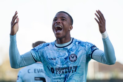 140326 - Barnet v Newport County - Sky Bet League 2 - Tanatswa Nyakuhwa of Newport County celebrates James Crole of Newport County goal