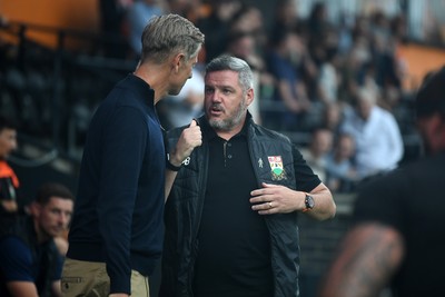 290725 - Barnet v Newport County - Carabao Cup Preliminary Round - Newport County Manager, David Hughes and Dean Brennan, Barnet Manager at the start of the game
