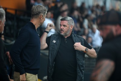 290725 - Barnet v Newport County - Carabao Cup Preliminary Round - Newport County Manager, David Hughes and Dean Brennan, Barnet Manager at the start of the game