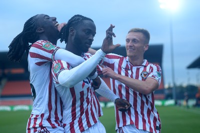 290725 - Barnet v Newport County - Carabao Cup Preliminary Round - Cameron Antwi of Newport County celebrates scoring the first goal of the match with team mates