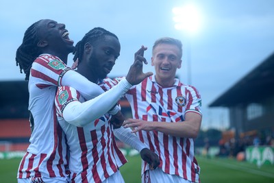 290725 - Barnet v Newport County - Carabao Cup Preliminary Round - Cameron Antwi of Newport County celebrates scoring the first goal of the match with team mates