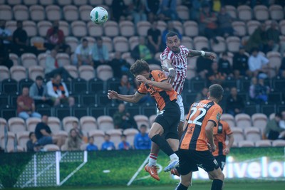 290725 - Barnet v Newport County - Carabao Cup Preliminary Round - Courtney Baker-Richardson of Newport County heads on goal