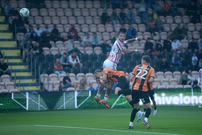 290725 - Barnet v Newport County - Carabao Cup Preliminary Round - Courtney Baker-Richardson of Newport County heads on goal
