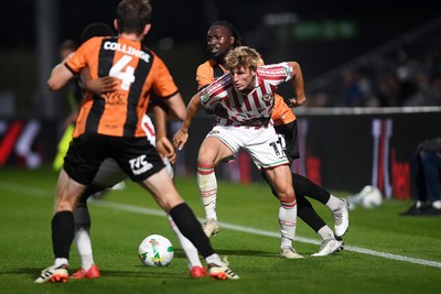 290725 - Barnet v Newport County - Carabao Cup Preliminary Round - Tom Davies of Newport County is challenged by Idris Kanu of Barnet