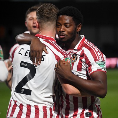 290725 - Barnet v Newport County - Carabao Cup Preliminary Round - Bobby Kamwa of Newport County celebrates the win at full time with team mates