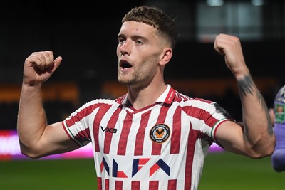 290725 - Barnet v Newport County - Carabao Cup Preliminary Round - Cameron Evans of Newport County celebrates the win at full time