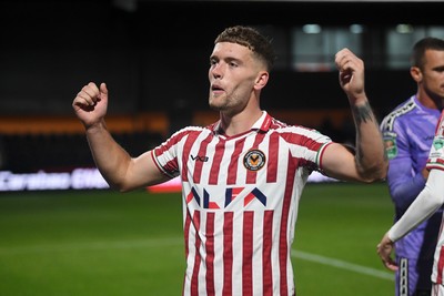 290725 - Barnet v Newport County - Carabao Cup Preliminary Round - Cameron Evans of Newport County celebrates the win at full time