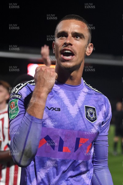 290725 - Barnet v Newport County - Carabao Cup Preliminary Round - Nik Tzanev of Newport County celebrates with fans at full time
