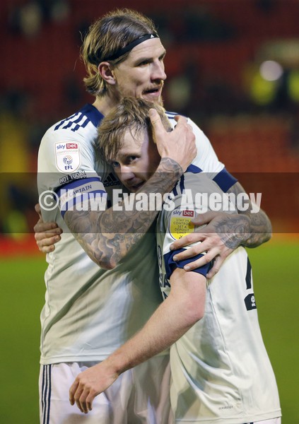 020222 - Barnsley v Cardiff City - Sky Bet Championship - Aden Flint of Cardiff celebrates with Tommy Doyle of Cardiff at the end of the match