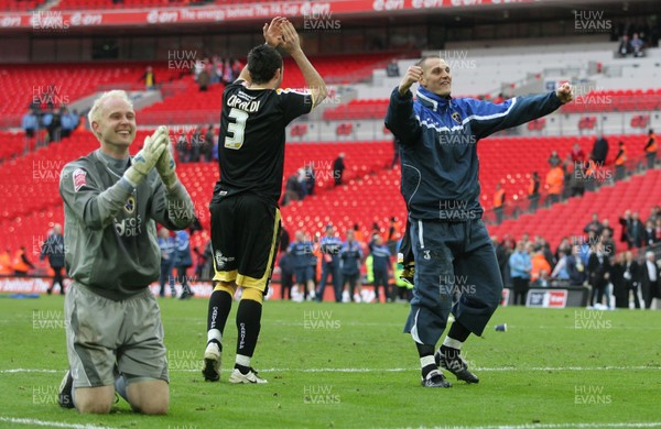 06.04.08 .. Barnsley v Cardiff City, FA Cup Semi-Final, Wembley Stadium -  Cardiff's keeper Peter Enckelman, Tony Capaldi and Darren Purse celebrate in front of the fans 