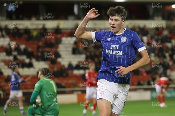 100326 - Barnsley v Cardiff City - Sky Bet League 1  Rubin Colwill of Cardiff scores the 1st goal of the match leaving Goalkeeper Owen Goodman of Barnsley floored