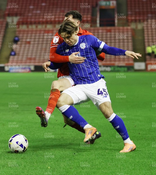 100326 - Barnsley v Cardiff City - Sky Bet League 1 - Cian Ashford of Cardiff and Corey O'Keeffe of Barnsley