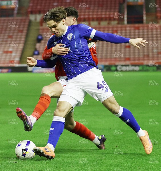 100326 - Barnsley v Cardiff City - Sky Bet League 1 - Cian Ashford of Cardiff and Corey O'Keeffe of Barnsley