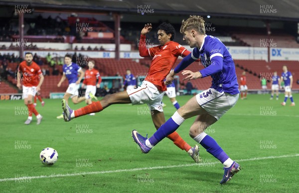 100326 - Barnsley v Cardiff City - Sky Bet League 1 - Joel Bagan of Cardiff takes a shot but thrown by Vimal Yoganathan of Barnsley