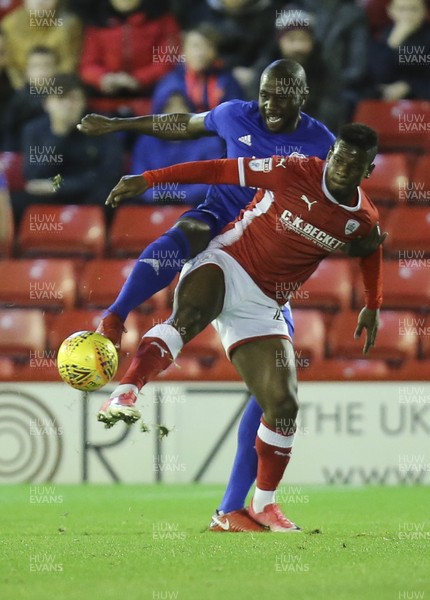 211117 - Barnsley v Cardiff City, Sky Bet Championship - Mamadou Thiam of Barnsley and Sol Bamba of Cardiff City compete for the ball
