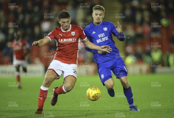 211117 - Barnsley v Cardiff City, Sky Bet Championship - Danny Ward of Cardiff City and Matty Pearson of Barnsley compete for the ball